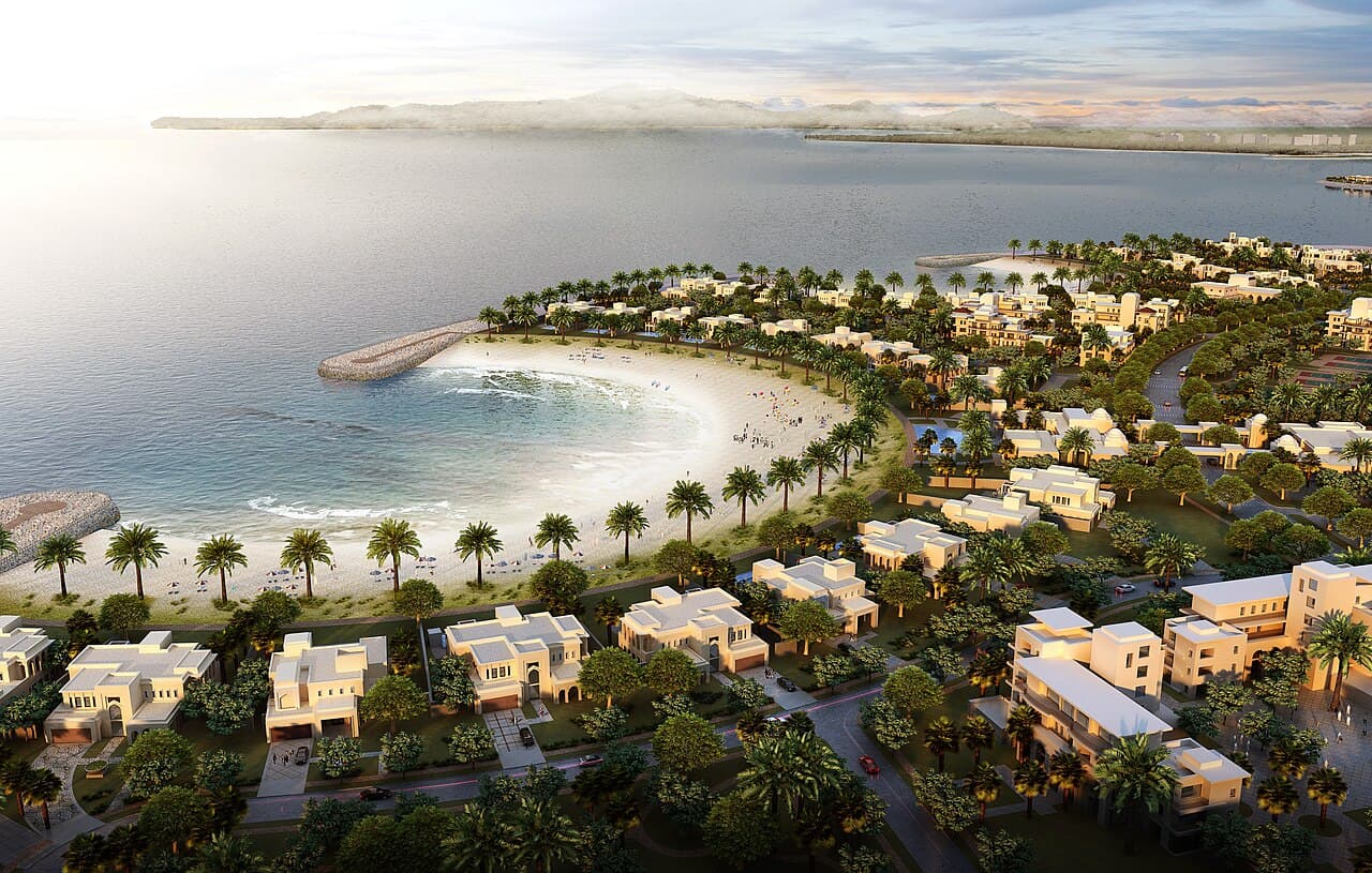 Aerial view of the Falcon Island setting in Al Hamra Village