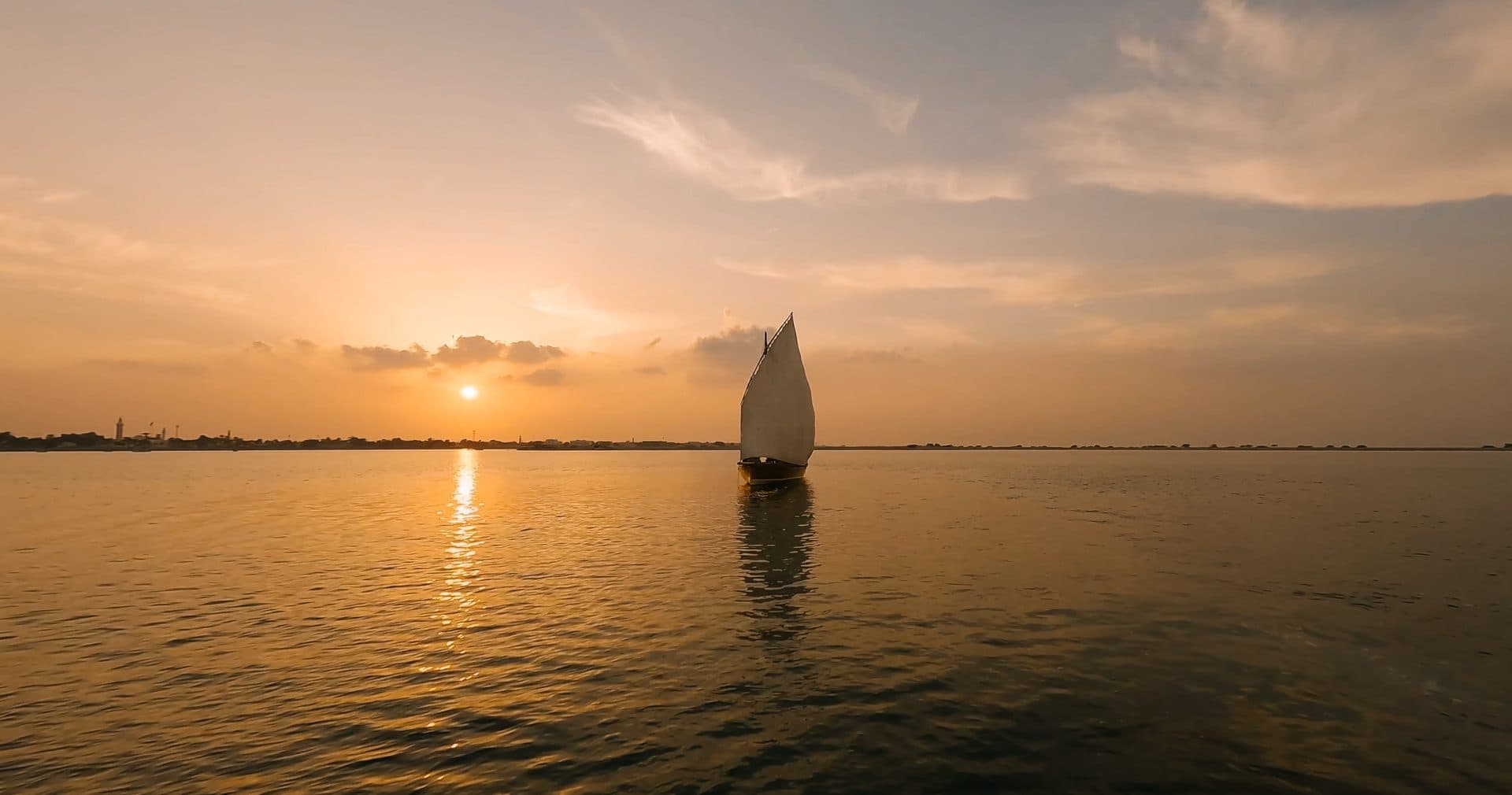 Boat on the Ras Al Khaimah coast, representing Al Mairid's coastal setting